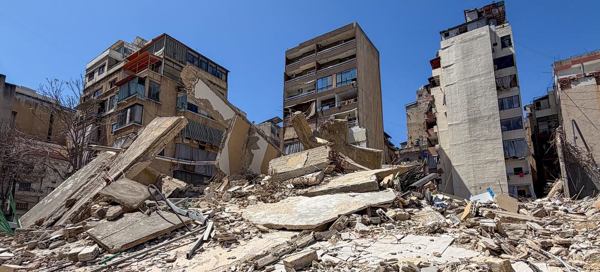 Destroyed residential buildings in the Basta neighborhood of Beirut, Lebanon, showing widespread rubble and debris following Israeli airstrikes.