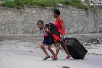 Los niños de todo el mundo se enfrentan a la amenaza de la violencia en situaciones de conflicto. (Niños en Haití en la foto)