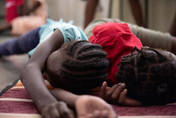 Children sleep in a school in Port-au-Prince, Haiti, where their families have taken refuge from gang violence.