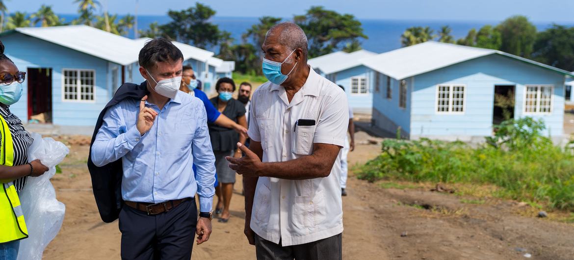 UN Resident Coordinator for Barbados and the Eastern Caribbean, Didier Trebucq (left) visits St. Vincent and the Grenadines six months after the volcanic eruption.