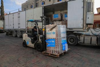 Lifesaving supplies for children and families are unloaded at a UNICEF warehouse in Gaza.