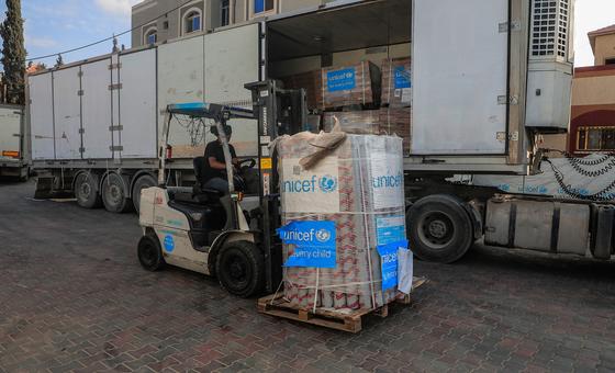 Lifesaving supplies for children and families are unloaded at a UNICEF warehouse in Gaza.