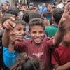 Niños de Gaza celebran el anuncio de alto el fuego.