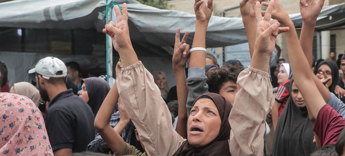 A woman celebrates the ceasefire in Gaza. A woman celebrates the ceasefire in Gaza.