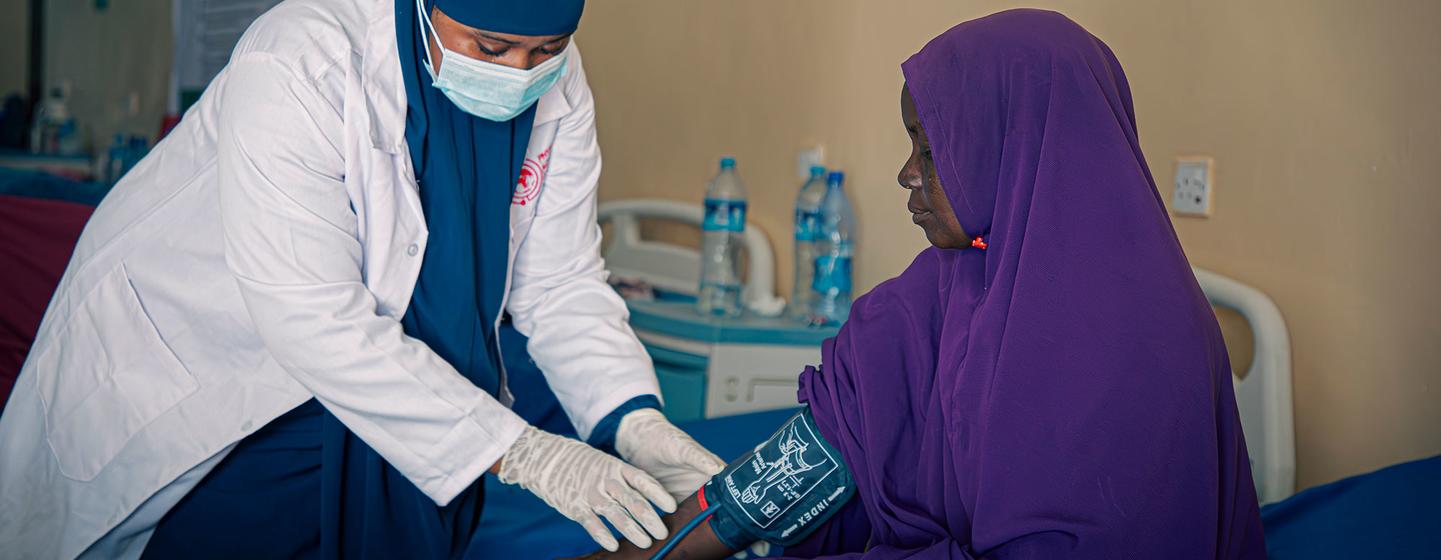 A patient recovering from fistula repair surgery is examined at Dayniile Hospital in Mogadishu, Somalia. A patient recovering from fistula repair surgery is examined at Dayniile Hospital in Mogadishu, Somalia.