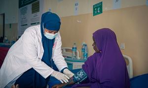 A patient recovering from fistula repair surgery is examined at Dayniile Hospital in Mogadishu, Somalia.