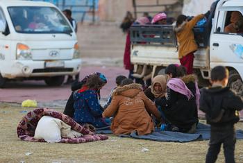 A family gathers at a reception centre in Ar-Raqqa city, Syria.