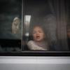 A child looks out a bus window in Rafah in the south of the Gaza Strip.