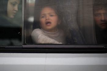 A child looks out a bus window in Rafah in the south of the Gaza Strip.