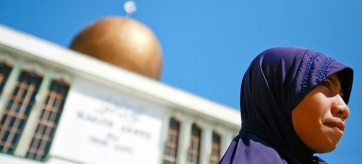 A Muslim woman stands in front of An-Nur mosque in Dili, the largest mosque in Timor-Leste. A Muslim woman stands in front of An-Nur mosque in Dili, the largest mosque in Timor-Leste.
