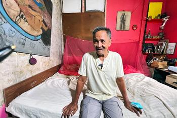 Toto Aquino in his bedroom at home in Manila.