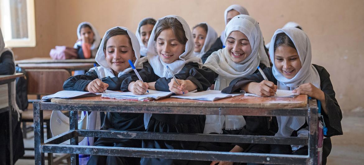 Young girls study at a school in Mazar-i-Sharīf, Balkh Province, Afghanistan.