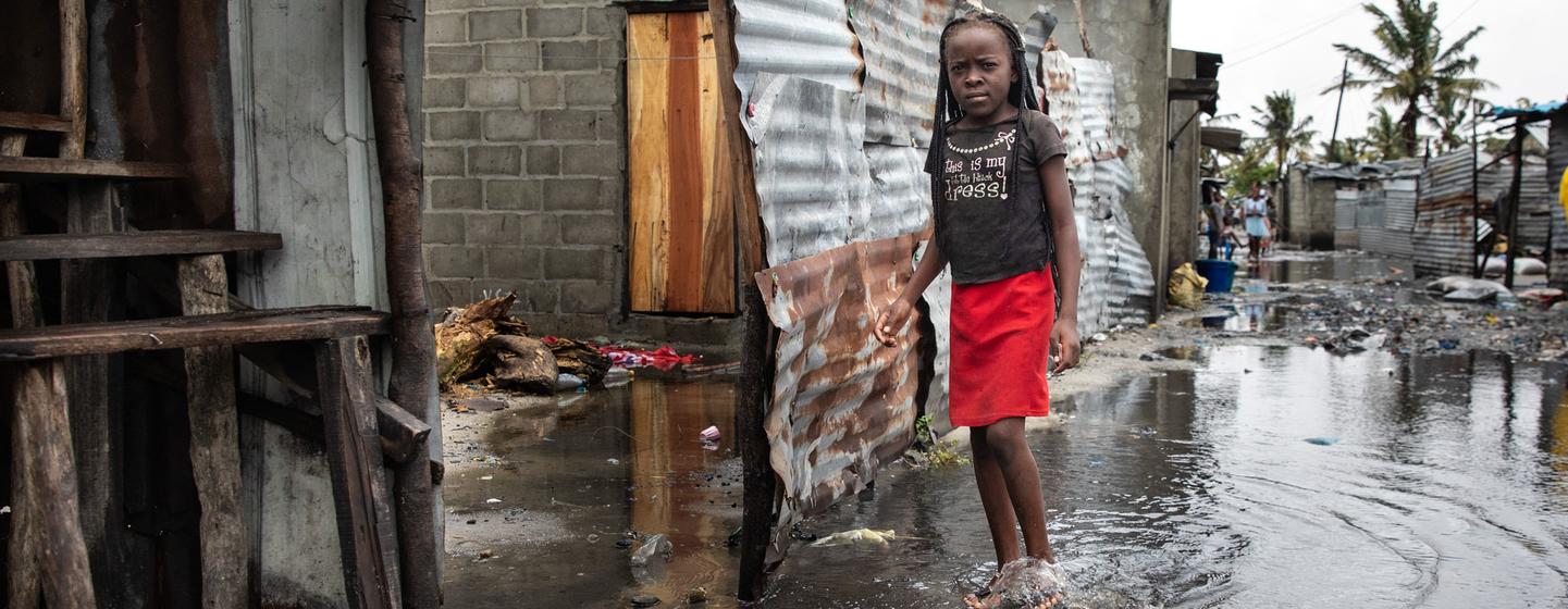 A child stands in rising water after Cyclone Eloise hit Beira, Mozambique. 