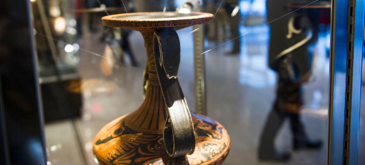 An artifact is displayed at an exhibition at UN Headquarters focused on protecting cultural heritage.