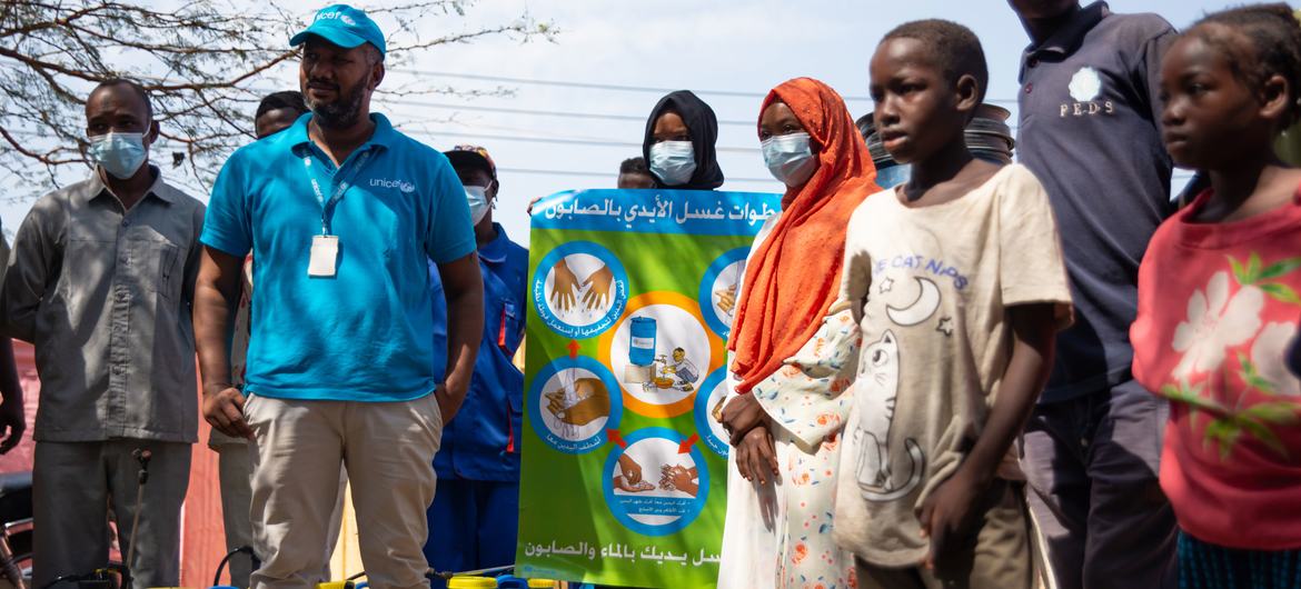 Children in Gedaref, Sudan learn about the dangers and symptoms of cholera.