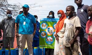 Children in Gedaref, Sudan learn about the dangers and symptoms of cholera.