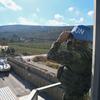 A UN peacekeeper looks out from a UNIFIL position in southern Lebanon.