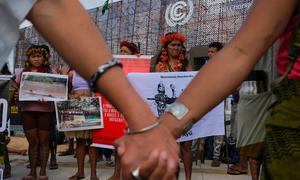 Munduruku Indigenous Peoples protest at the UN Climate Conference in Belém, Brazil. 