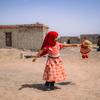 A girl plays in Al-Jufaina camp for displaced people in Marib, Yemen.