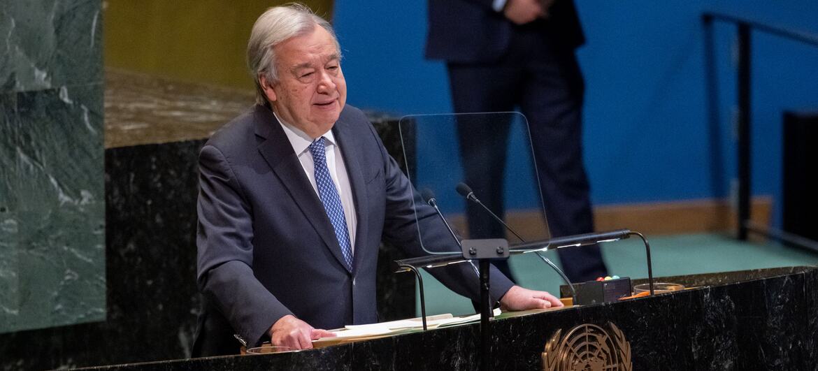 António Guterres, UN Secretary-General, delivering a speech at the UN General Assembly podium with the UN emblem visible.