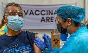 A man receives a COVID vaccination in Caloocan City in the Philippines. (file)