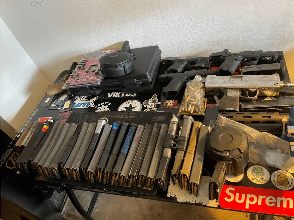 Seized guns and ammunition destined for are put on show by US authorities. 