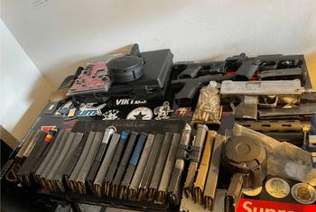 Seized guns and ammunition destined for Haiti are put on show by US authorities.  Seized guns and ammunition destined for Haiti are put on show by US authorities.