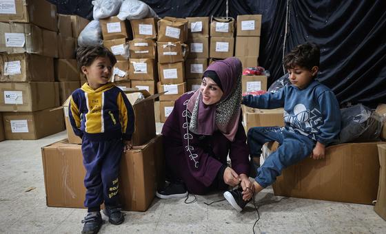 Children in the Gaza Strip receive winter clothing kits from UNICEF.