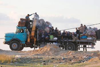 Families flee south from the central Gaza Strip.