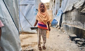 A young girl fled conflict in Al Hudaydah with her family and now lives in a displaced camp in Aden, Yemen.