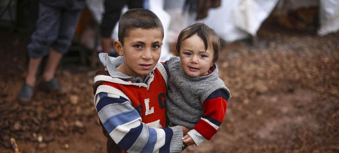 Displaced children living in an informal settlement in northwest Syria.