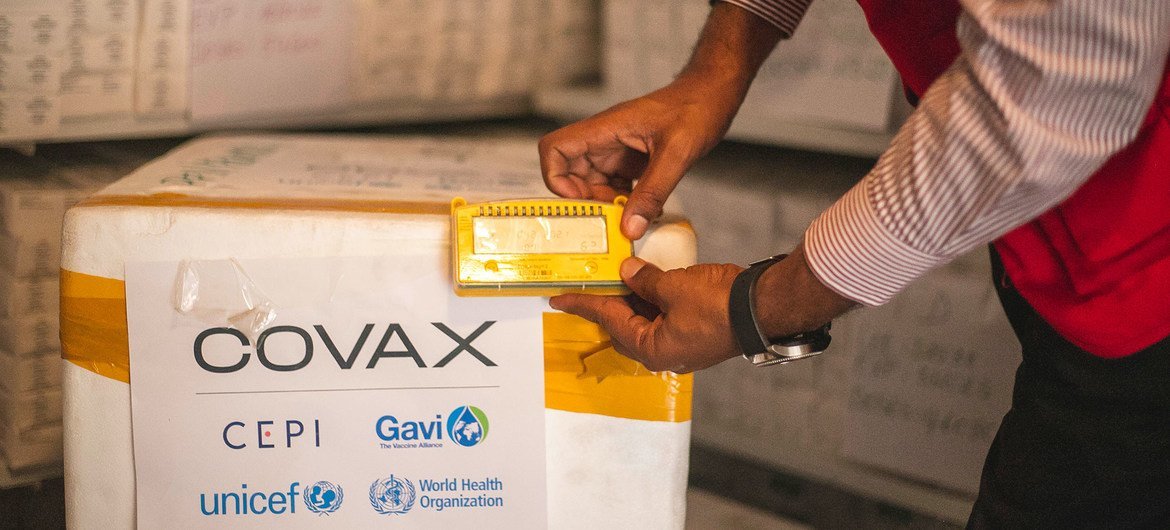 A delivery of COVID-19 vaccination doses provided through the COVAX Facility is checked in Goma, in the eastern Democratic Republic of the Congo.