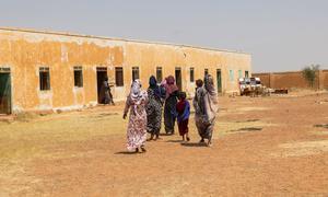 On 17 October, families arrive at the UNICEF-supported mobile clinic in Fatasha village located in West Omdurman near North Kordofan for health services.