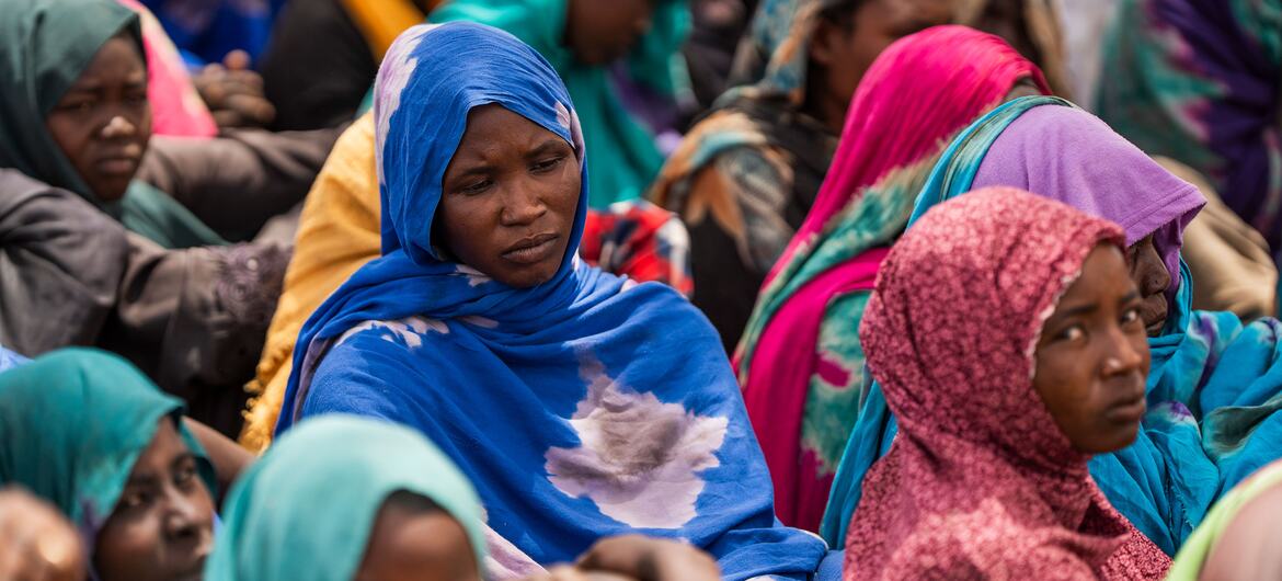 ? UNHCR/Ala Kheir Sudanese refugees gather at a temporary site in Koulbous, Chad, near the border with Sudan after fleeing the ongoing conflict. (file) ? UNHCR/Ala Kheir Sudanese refugees gather at a temporary site in Koulbous, Chad, near the border with Sudan after fleeing the ongoing conflict. (file)