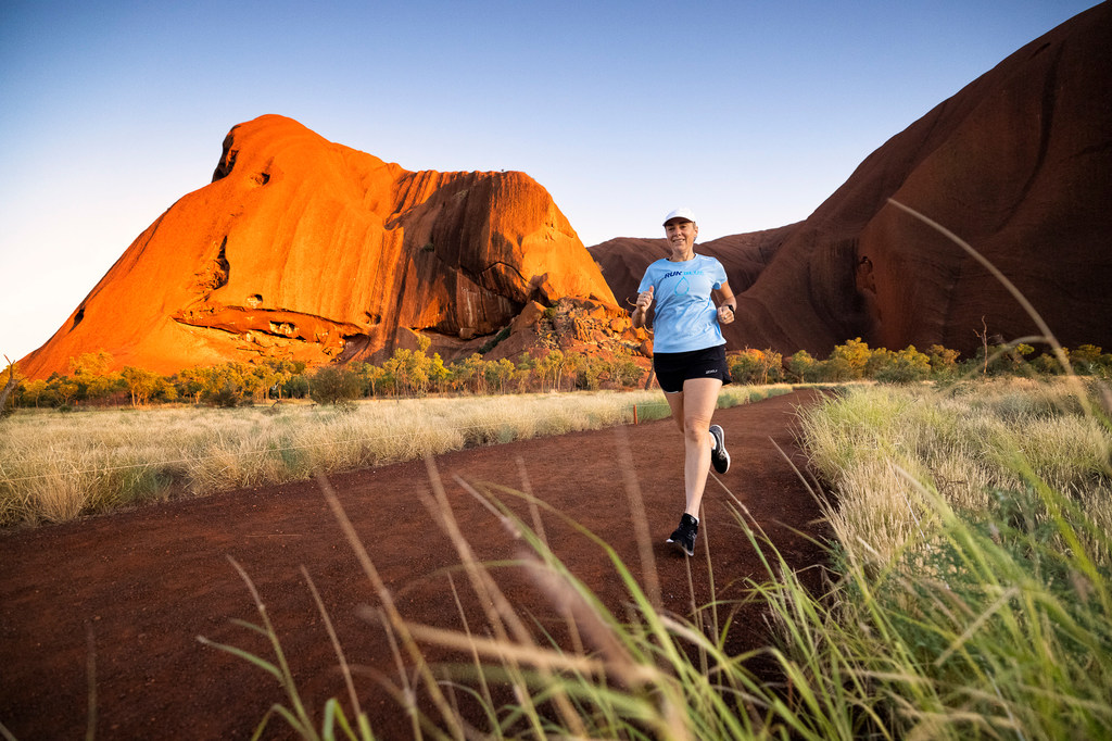Mina Guli runs a marathon in Uluru, Australia, for the Run Blue campaign.