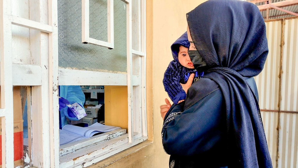 A mother fills a prescription for her child at a hospital in Kabul, Afghanistan. (file photo)