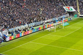 The Sustainable Development Goals are promoted on hoardings at Gamba Osaka's stadium.