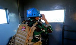 A UNIFIL peacekeeper looks out of a position at the mission's Naqoura headquarters.