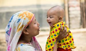 A mother and child attend a nutrition centre in Bangladesh.