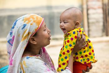 A mother and child attend a nutrition centre in Bangladesh.