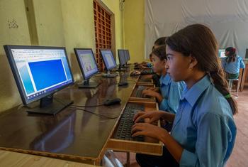 Students attend a computer class at a secondary school in Kailali, Nepal.