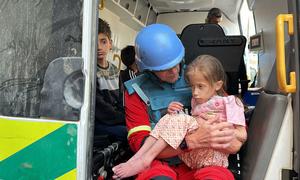 A young girl suffering from acute malnutrition is transferred from Kamal Adwan Hospital in northern Gaza to a field hospital in the south in April 2024. (file)