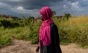 A young woman walks through  Kadugli town, South Kordofan state of Sudan, where sexual abuse is 'rampant', rights investigators said.