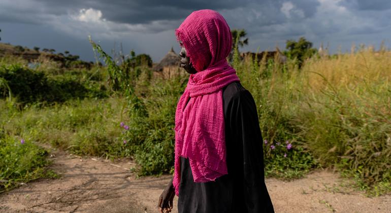 A young woman walks through  Kadugli town, South Kordofan state of Sudan, where sexual abuse is 'rampant', rights investigators said.