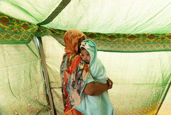 An internally displaced woman and child in Kosti, White Nile in Sudan.
