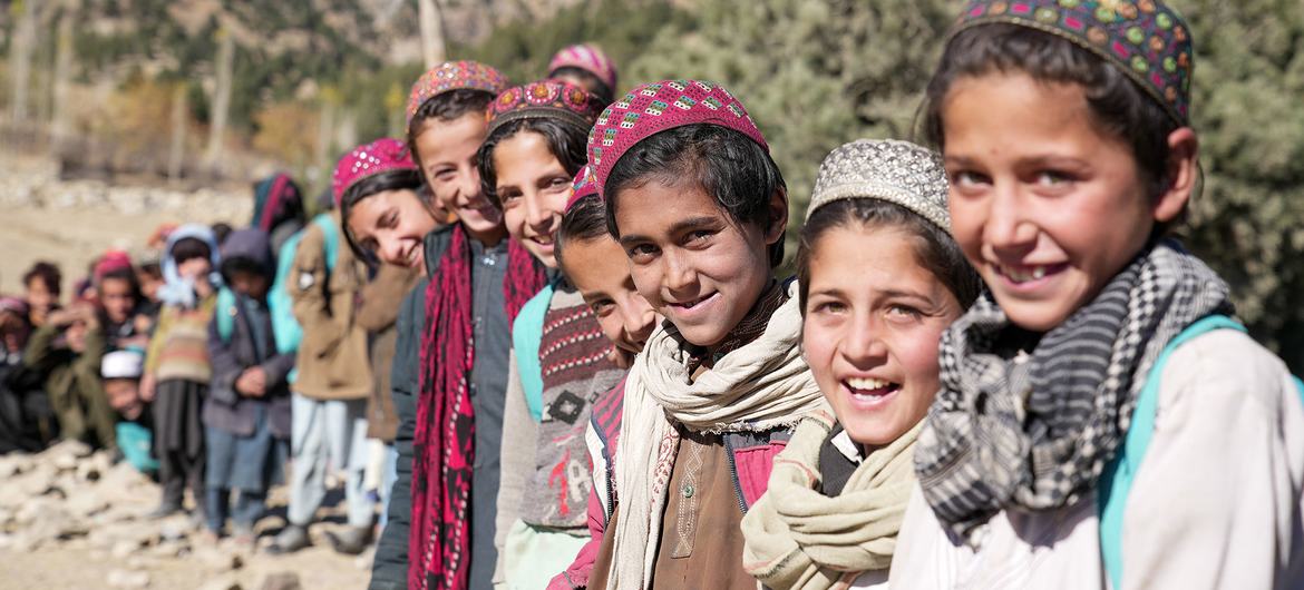 Children line up outside a community education class in Spera District, Afghanistan. Reaching the SDGs will likely cost more than $1,200 per person per year to 2030.