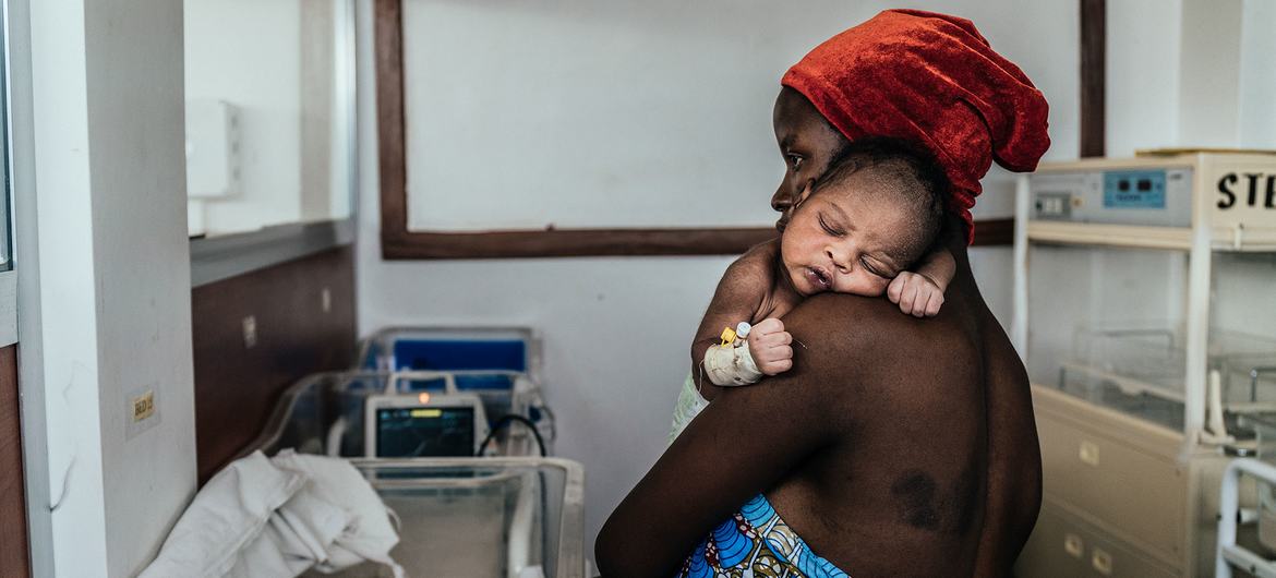 A mother cares for her baby at a neonatal intensive care unit in Mbeya, Tanzania.