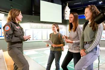 Mindy Howard talks with girls about space.  Mindy Howard talks with girls about space.