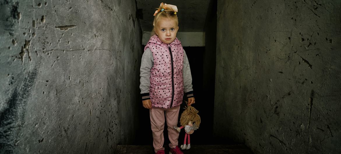 A four-year-old girl shelters at her kindergarten in the Kharkiv region of Ukraine.