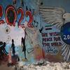 جدارية في سوريا تتخيل عالماً أكثر سلاماً.